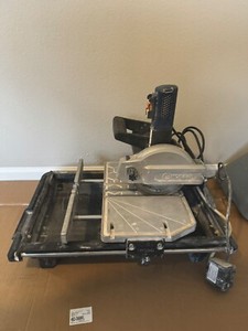 Saw for wet tiles of 7 inches.