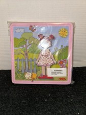 HABA Dress-up Doll Lilli Magnetic Travel Toy, 50 Magnet Pieces 4 Background