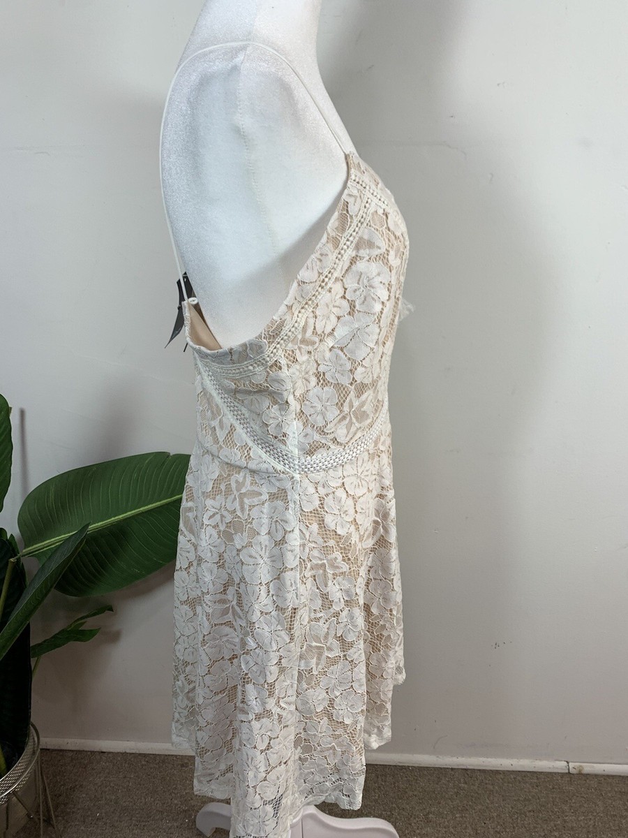 white lace dress with pockets Jenny White Lace Trim Mini Dress - US 2 main image 0