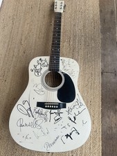 White acoustic guitar signed by 14 guitar legends inc donovan james taylor PROOF