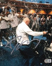 DAN HURLEY signed (U-CONN HUSKIES) Connecticut basketball 8X10 BECKETT BL65502