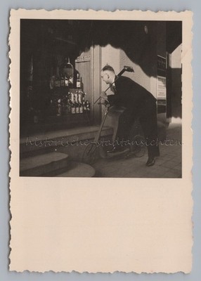 Man with Tripod Camera and Scooter in Front of Liquor Store BOLS 1575 Photo