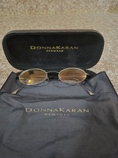 Donna Karan Women's Gold Metal Oval Sunglasses Brown Tinted Plastic Lenses