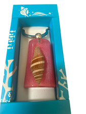 Key Ring- SEA LIFE curved rectangle- striped sea shell- pink background