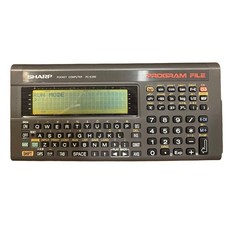 SHARP PC-E200 Pocket Computer Z80 CPU 32KB RAM Tested Vintage w/ Box