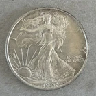 1943 Walking Liberty Half Dollar 90% Silver Ungraded with Some Toning. Nice