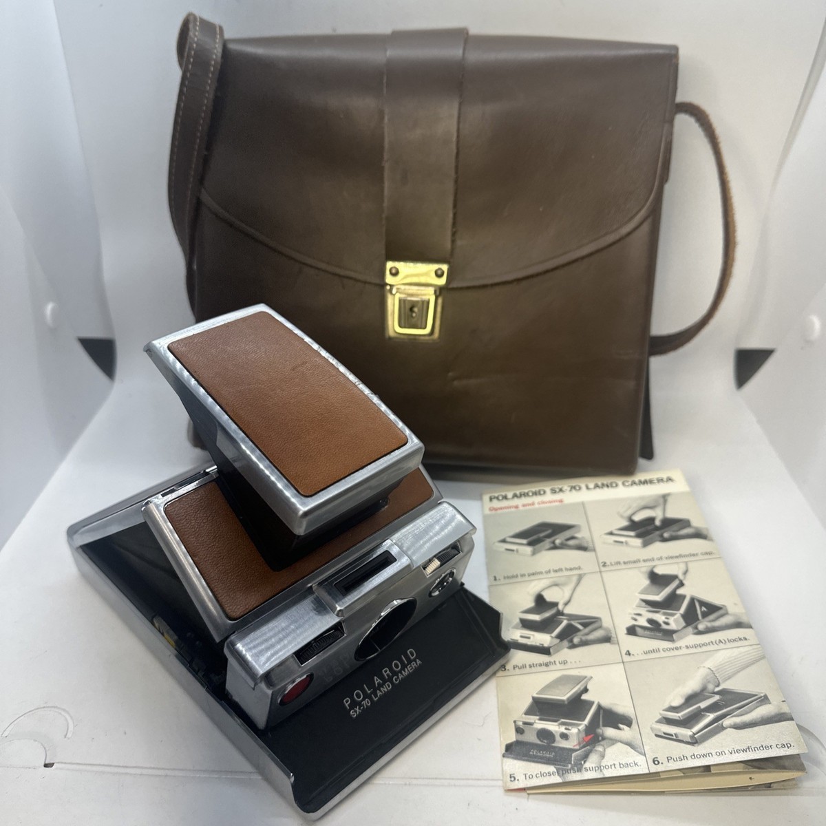 Polaroid SX-70 Land Camera + Leather Case & Instructions Polaroid SX-70 Land Camera + Leather Case & Instructions