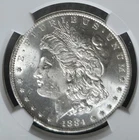 NGC - 1884 O Morgan Silver Dollar - MS 63. Hand Signed, Under-Grade? A1191.