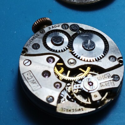 V.W.Co Vertex Watch Co Buser watch movement 11.6mm Swiss 1940 balance seems OK