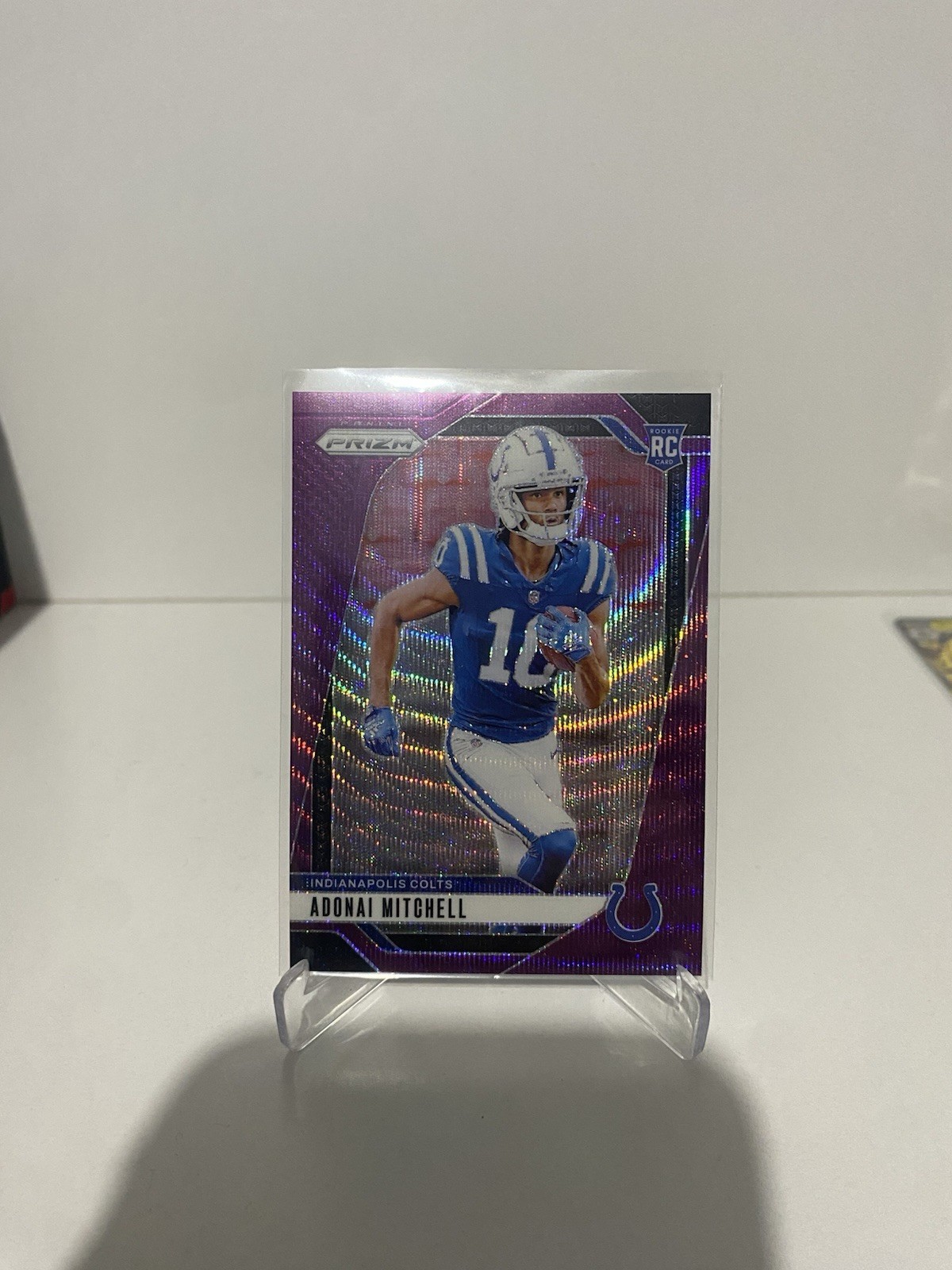 2024 Panini Prizm - Rookies Adonai Mitchell #303 Purple Wave Prizm /99 (RC)