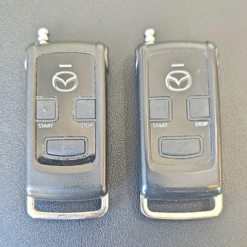 2 Mazda OEM dealer-installed remote engine start key fobs part PZ170-21021 - product listing photo