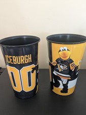 Two Pittsburgh Penguins Suvinior Cups With The Mascot Iceburgh