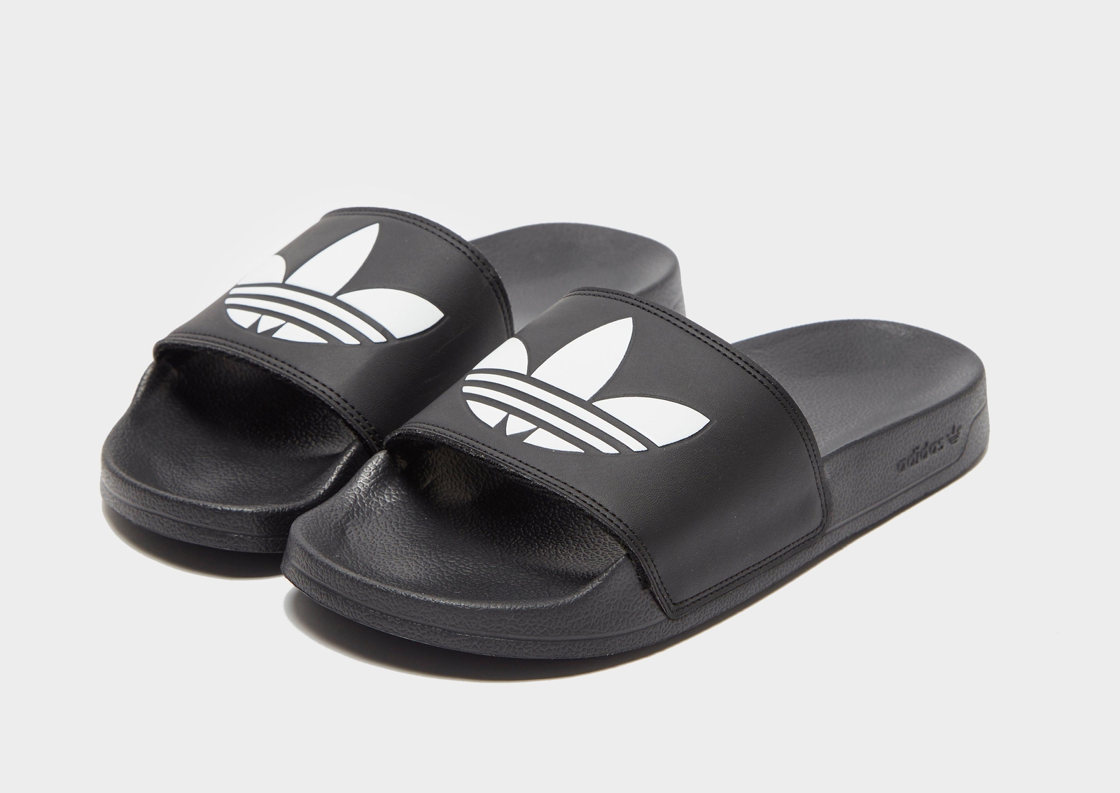 Кроссовки adidas Originals Adilette Германия Великобритания 7 405 евро schwarzwei 10590₽