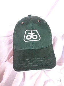 dark green baseball cap