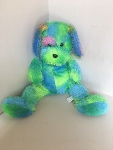 green stuffed dog