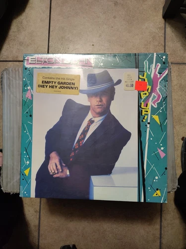 "Jump Up" by Elton John  [Vinyl. from 1982. Sealed in shrink wrap. never opened]