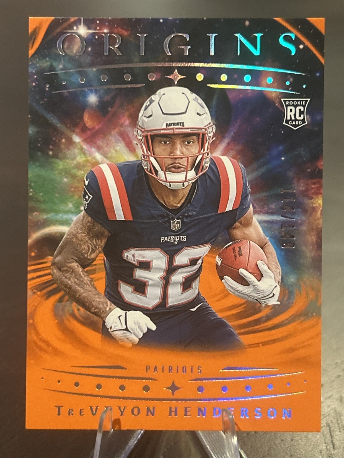 2025 Panini Origins - Rookies TreVeyon Henderson #105 Orange /149 (RC)