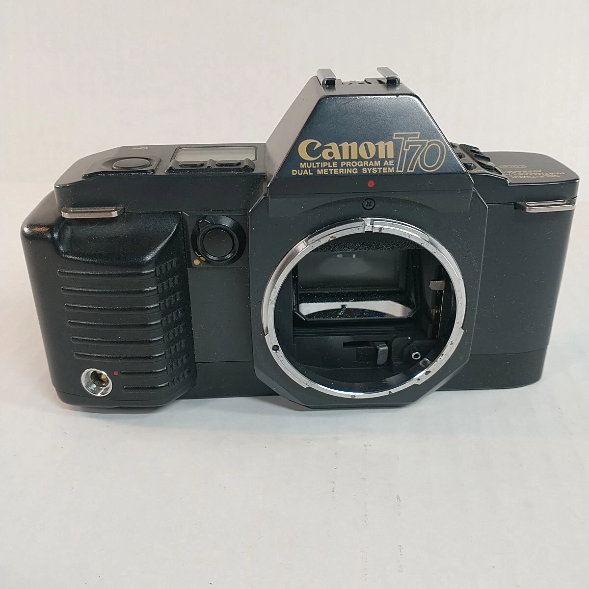 Canon T70 Film Camera With A Standard 50mm f/1.8 FD Lens