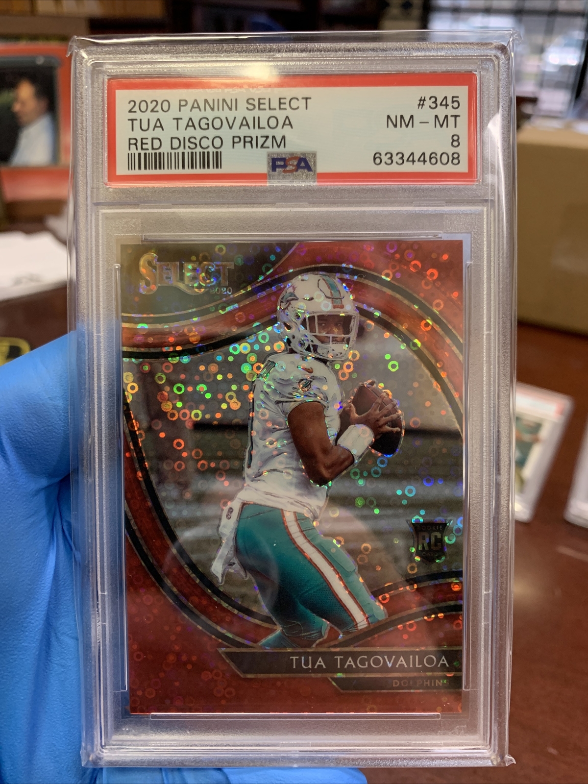 2020 Panini Select Tua Tagovailoa Field Level Red Disco Prizm RC 5/49 PSA 8