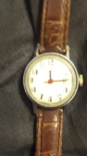 Analog Wristwatch Brown Leather Strap Silver Case White Dial Arabic Numerals