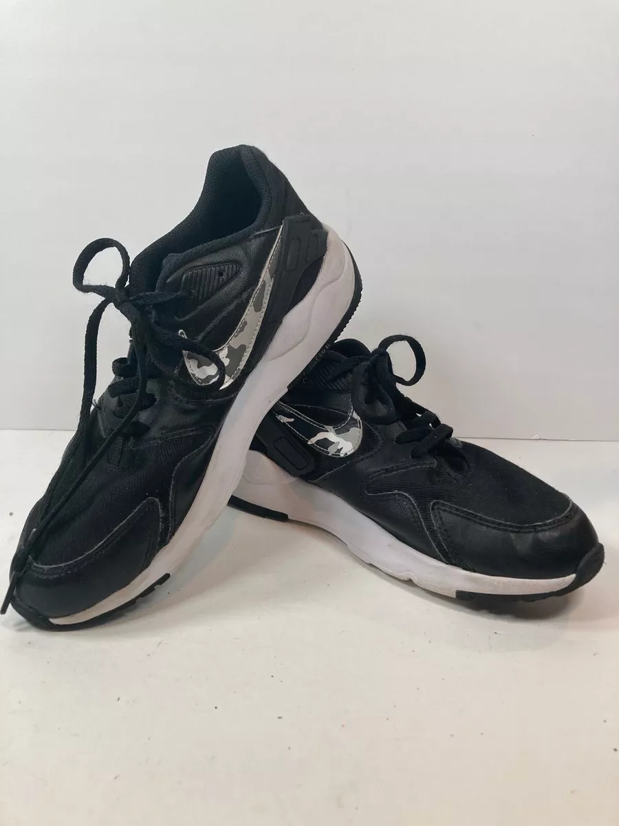 Boys nike camo shoes hotsell