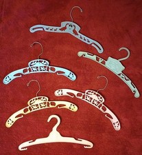 6 Vintage 60s Childs Plastic Swivel Clothes Hangers Circus Ducks Cowboy Squirrel