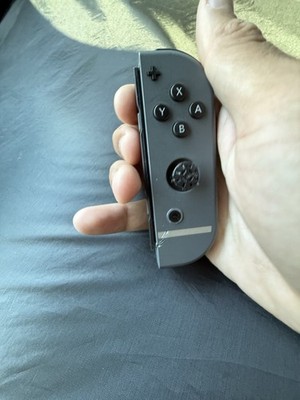 AUTHENTIC Nintendo Switch LEFT  Super Smash Bros Gray Silver Joy Con Oled TESTED