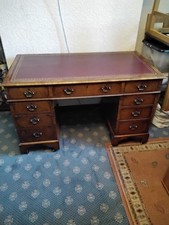 Mohogony/ Leather Topped 9 Drawer Period Desk.