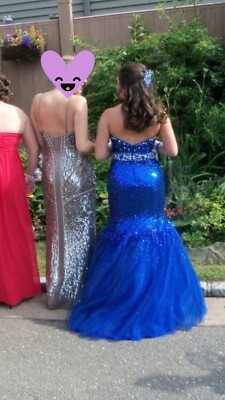 R blue mermaid dress used once sequins a few loose Sequins. clean was $800.  Sz6