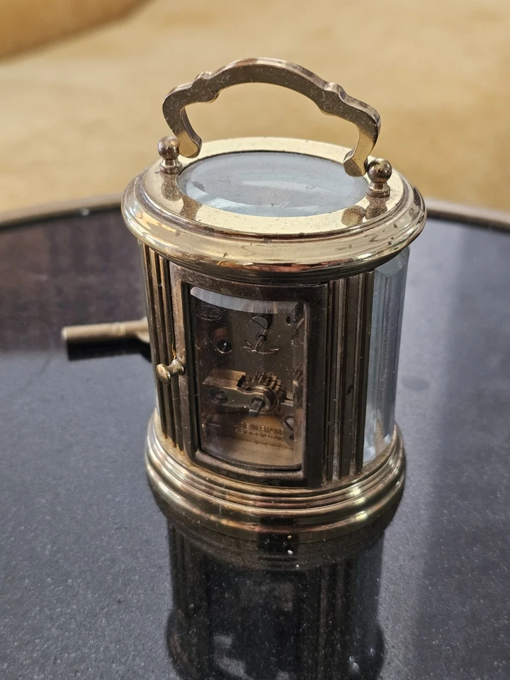 Старинный латуни L' EPEE Sainte Suzanne французский 11 драгоценностей овальный перевозки часы w/ключ  - Изображение 3 из 4