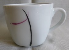 KHG Kaffeetasse weiß mit lila-schwarzem Stri...