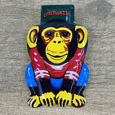 Vintage Tin Litho Noisemaker Party Clicker Chimpanzee Made in Japan Bright Color