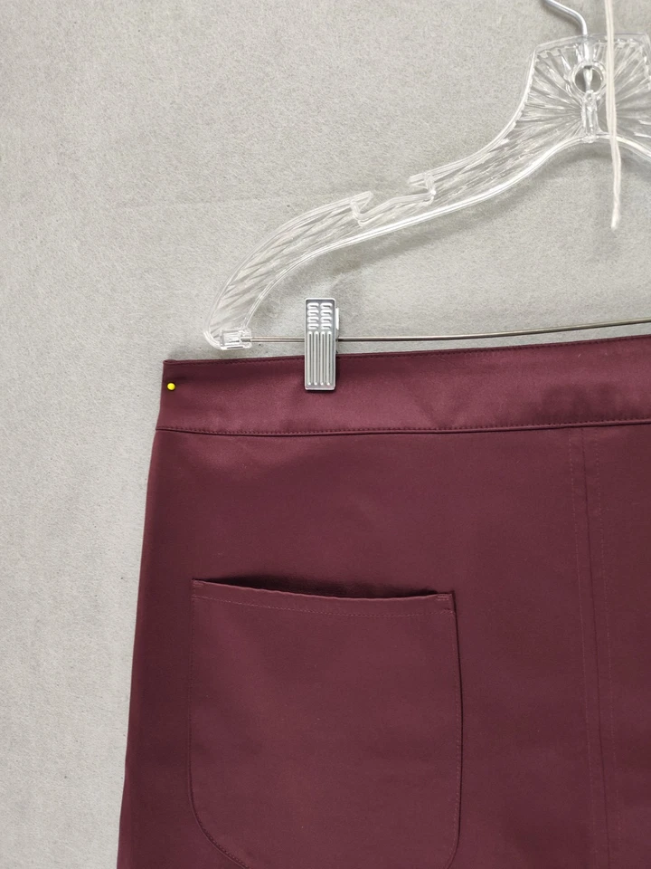 H M Mujer Falda 16 Borgoña Mezcla Poli Bolsillos Frontales Ajuste Regular Satinado Mini Foto 2 de 4