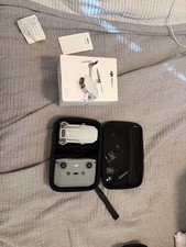 DJI Mini 2 SE Lightweight Mini Drone - **Less Than 30 Min Flight Time** Unbound