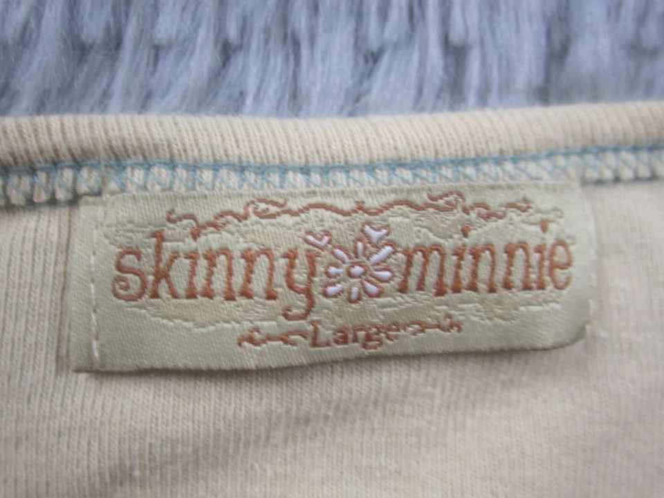 Camisa grande ajustada Minnie para mujer sin mangas informal estampado envolvente cuello redondo Foto 4 de 4