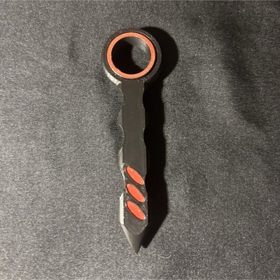 Black and red spinning, fidget toy Kuboton 
