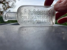 C. N. O. CHRETIEN DRUGGIST NEW ORLEANS, LA. OLD PHARMACY BOTTLE