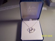 NEW " A MOTHER HOLDS HER CHILD'S HEART FOREVER" STERLING SILVER PENDANT W/CZ GEM