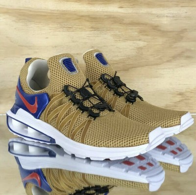 nike shox gravity gold