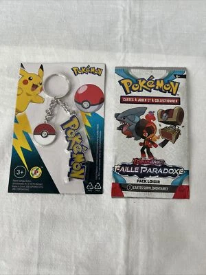 POKÉMON PIKACHU POKÉBALL  PORTE CLÉ MÉTAL NEUF SOUS BLISTER + 1 BOOSTER SCELLÉ - Photo 1/4