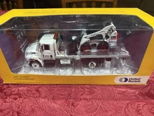 (New) 2009 First Gear United Rentals  Flatbed & Bobcat S300 Skid-Steer Loader