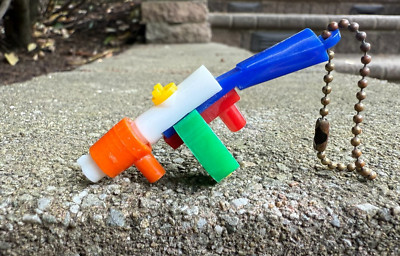 Vintage Plastic Pull Apart Puzzle Keychain Tommy Gun