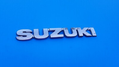 05 06 07 08 SUZUKI RENO REAR GATE LID CHROME EMBLEM LOGO BADGE SYMBOL OEM A23