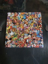 Disney Collector Pins puzzle, complete in box, plus loose Lorcana cards