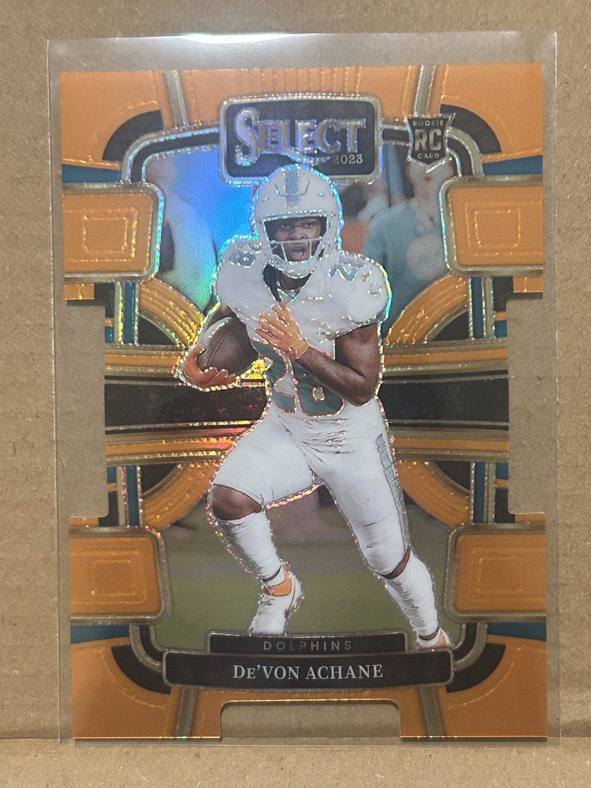 2023 Panini Select - Concourse De'Von Achane #63 Orange Prizm Die-Cut /499 (RC)