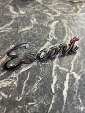 VINTAGE ORIGINAL MATCHING BADGE CAR FORD ESCORT 1970s MANCAVE