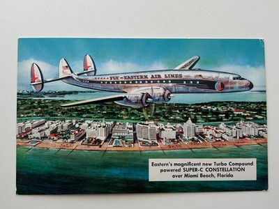 UNUSED 1950s Chrome Postcard EASTERN AIRLINES SUPER-C CONSTELLATION over Miami