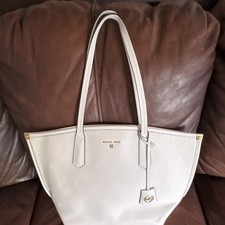 Borsa Michael Kors bianca ciottoli ciondolo oro ferramenta media
