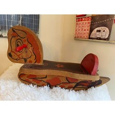 This is an adorable 1950's wooden rocking horse; original paint