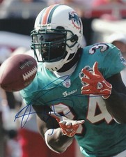 RICKY WILLIAMS SIGNED MIAMI DOLPHINS 8X10 PHOTO # 1 RICKY WILLIAMS SIGNED MIAMI DOLPHINS 8X10 PHOTO # 1